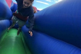 Bouncing Crazy Bouncy Castle Hire Gladiator Duel Hire Profile 1