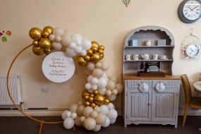 Baby shower half hoop with white, nudes and gold.