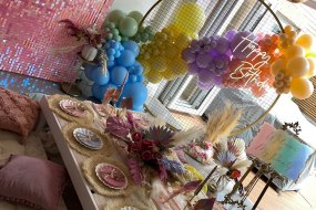 Luxe picnic tables, backdrops and neon sign