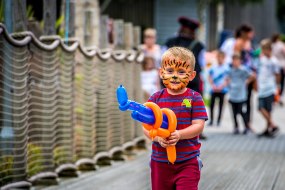 Face painting at a fun day event