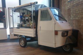 White Piaggio Ape coffee van