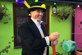 The Conwy Jester balloon modelling as a Victorian gent