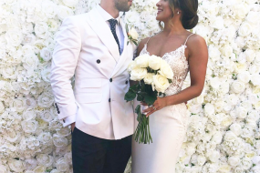 Aphrodite Flower Wall - Perfect backdrop for the beautiful bride & groom.