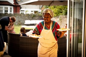 Shebah serving guests