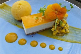 Mango cheesecake, mango passion fruit salsa