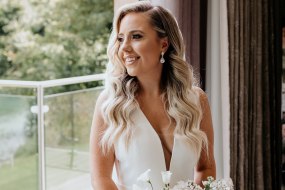 Beautiful bride Grace chose a soft Hollywood wave for her wedding in the Cotswolds