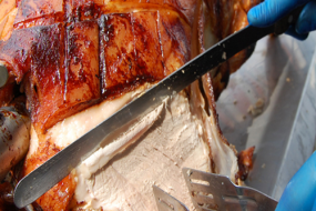 A succulent hog roast being carved