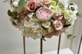 We create a wide range of floral arrangements for tables, top tables, backdrops and arches.