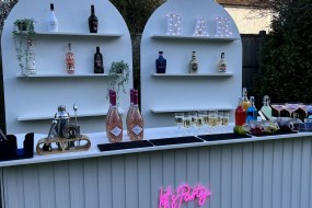 White Slatted bar with backdrops