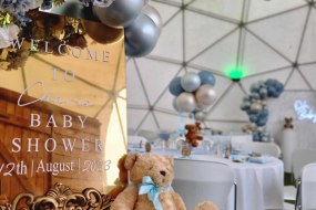 Luxury balloon decor featuring matching welcome sign, backdrop and table centrepieces