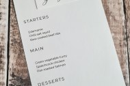 Menu with wax seal and name tag