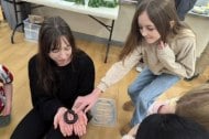 Me (Hayleigh) showing my Olive Millipede to children at a birthday party