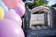 10 by 12 ft Grey and white bouncy castle 