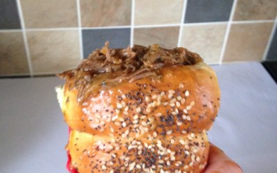 Honey pulled pork in seeded bread cone 