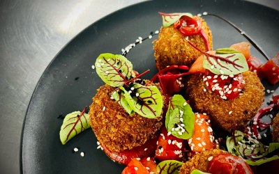 Pig cheek bon bons, Gochujang ketchup, Pickled watermelon, Red vein sorrel,