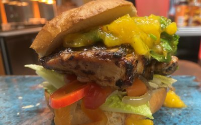 Jerk burger, mango salsa, escovitche veggies, homemade bun