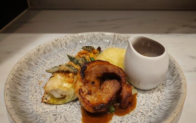 Rolled Pork Belly, Hispi Cabbage, Dijon Mash, Sage & Cider Jus