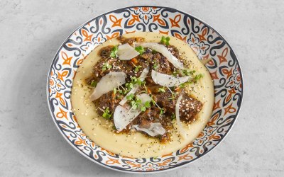 Slow cooked beef with broad beans fava, parmesan shavings, sesame seeds and poppy seeds