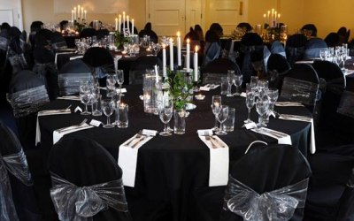 Black Stretch Chair Covers + Silver Organza Sash