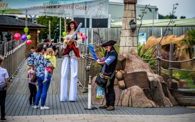 Stilt wakers and balloon modelling at a pirate event!