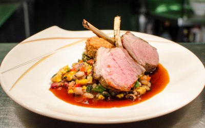 Lamb rack,corn succotash, braised lamb neck hash and collard greens