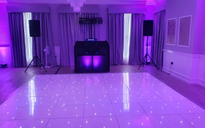 DJ Booth Available. Seen here with optional up-lights.