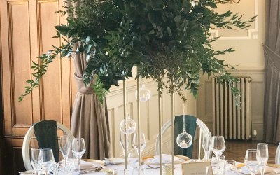 Gold Planters with Foliage Spray & Hanging Baubles at Matfen Hall