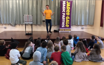 Performing at a children's birthday party in a village hall.