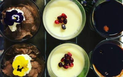 Chocolate mousse, lemon posset and raspberry creme brûlée served in pudding glasses