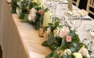 Eucalyptus garland interspersed with flowers