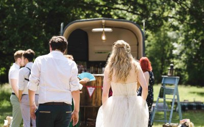 The bride and groom going for a well deserved refreshment.