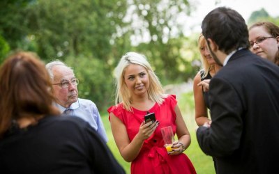 Performing close-up at a wedding.