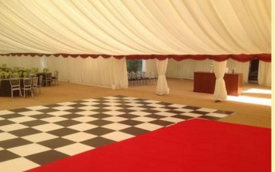 Large function for Hilton. Black and white dance floor. 15m wide marquee.