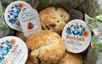 Box of homemade scones, clotted cream, strawberry preserve & butter 