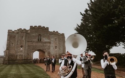 Leading the wedding party to the reception barn