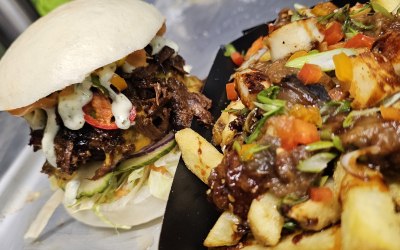 BulGoGi BaoGer' Handmade Ground Beef Patty, Korean glazed smoked brisket, J+B Relish, Asian Slaw, Mild Green Chilli Sauce on Freshly Steamed Bao Buns. + Miso Aubergine Loaded Fries.