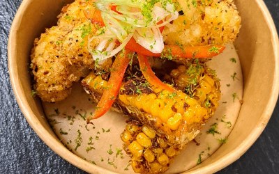 A newbie, vegan 'ribs n wings' with charred cauliflower and dry rub corn riblets.