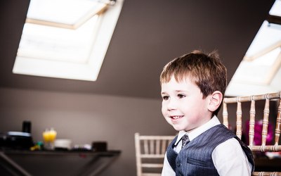 Cute boy in his finery at a wedding