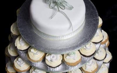 Wedding cake with cupcakes