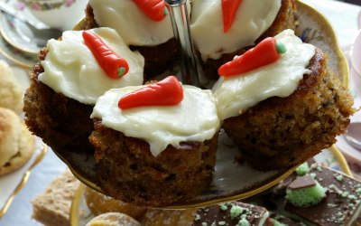 Individual carrot cakes on a three tier cakestand