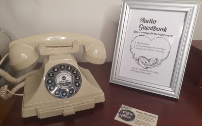 Cream Retro Audio Guestbook phone with a silver frame.