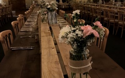 Fairy lights with rustic tables and beechwood chairs