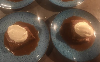 Homemade brownie with caramel sauce and vanilla ice cream 