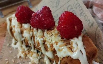 waffle pop/melted white choc/ raspberries & roasted coconut