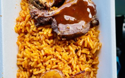 Our smoky jollof rice paired with beef suya and charcoal grilled lamb chop