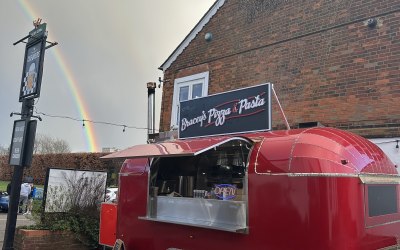 Forget a gold pot… Pizza is at the end of the rainbow!