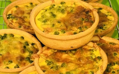 Vegetarian quiche, peas, leeks ,spinach and matured cheddar 