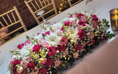 Top table fresh floral arrangement 