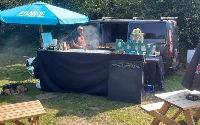 Our Mobile Catering Van set up serving Smash Burgers within the pub garden of one of our residencies - The Anchor Pub, Bourn End, Hemel Hempstead