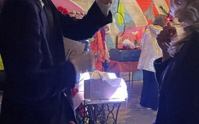 Performing the Chinese linking rings at a fundraising party